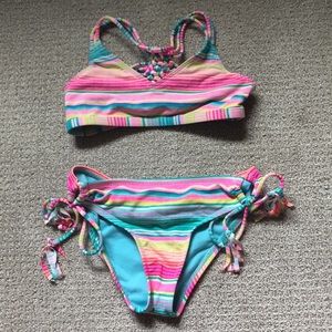 girls multi colored swimsuit with cool back